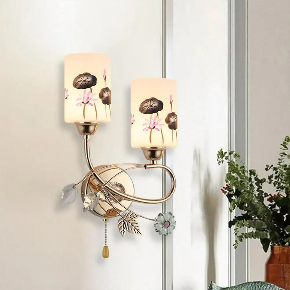 Modern lotus gold finish wall sconce with glass shade, pull chain, decorated with pink lotus flowers and metal vines