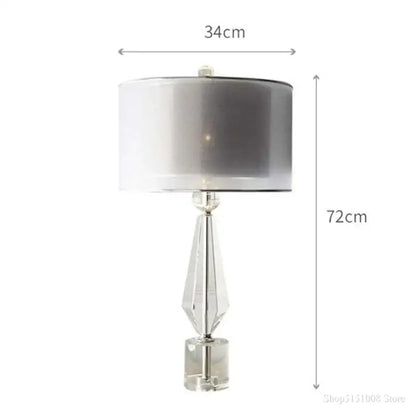 Modern luxe gray and crystal table lamp with faceted crystal base and silver gradient shade for bedroom lighting