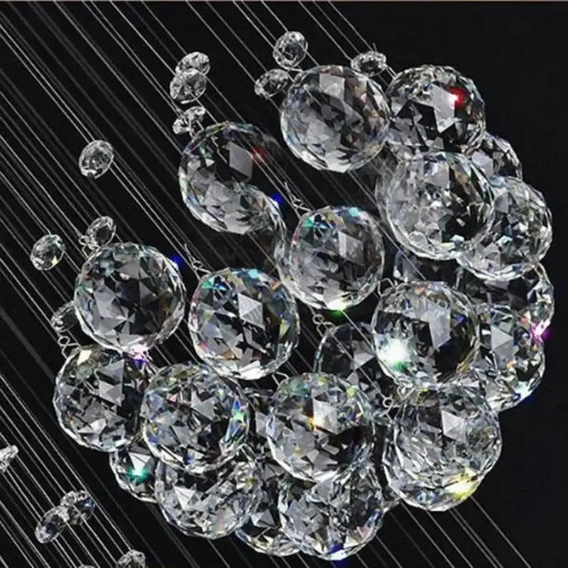 Modern luxury crystal ball led chandelier with clear faceted crystal spheres suspended by thin wires for living room decorbites crystal ball