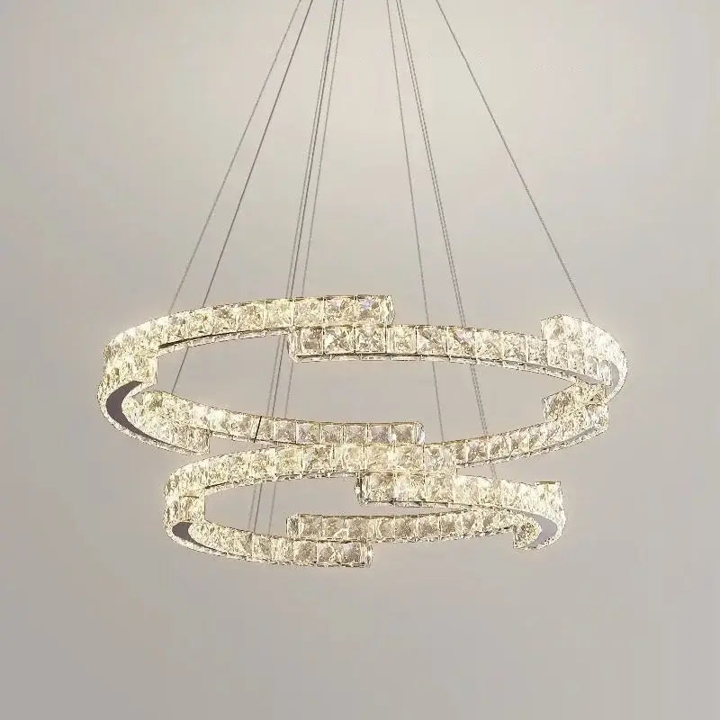 A modern luxury crystal led chandelier with multi-tiered interlocking rings suspended by thin wires for foyer decorbites crystal led