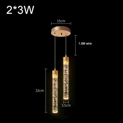 Gold-toned modern luxury cylindrical pendant lamps with sparkling crystal interiors for living room and bedroom decor
