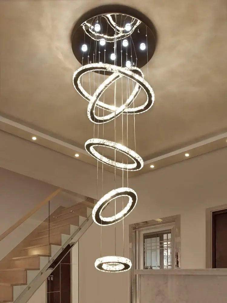Modern luxury decorbites crystal rings chandelier with glowing spiral rings and embedded crystal accents for staircase lighting
