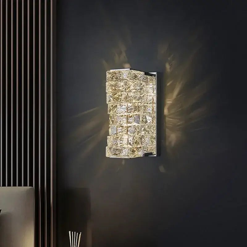 Modern luxury gold and crystal led wall light with stacked faceted crystal cubes in a sleek chrome frame for living room