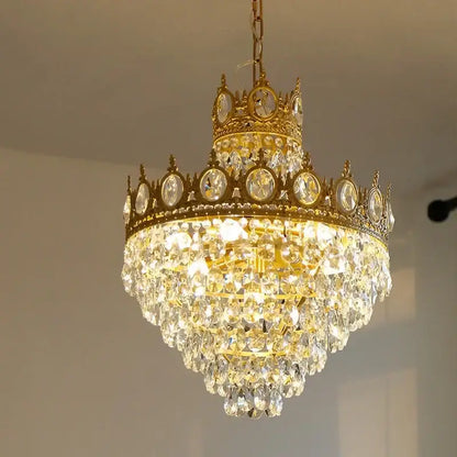 Modern luxury gold crystal crown chandelier with cascading clear and faceted crystals by decorbites crystal crown