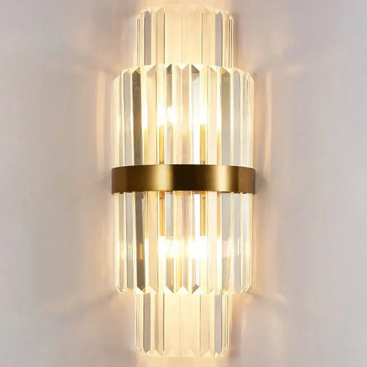 Modern luxury gold crystal led wall lamp with vertical crystal prisms for elegant bedroom decorbites crystal led wall design