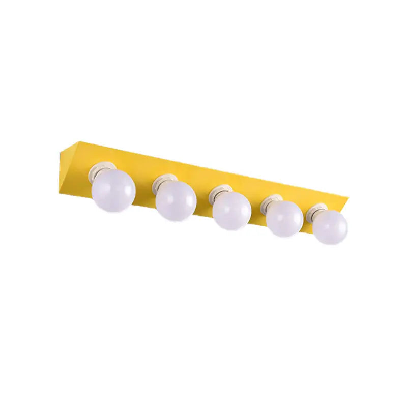 Modern macaron pink and yellow 5-light vanity sconce with bright yellow rectangular fixture and five round white bulbs