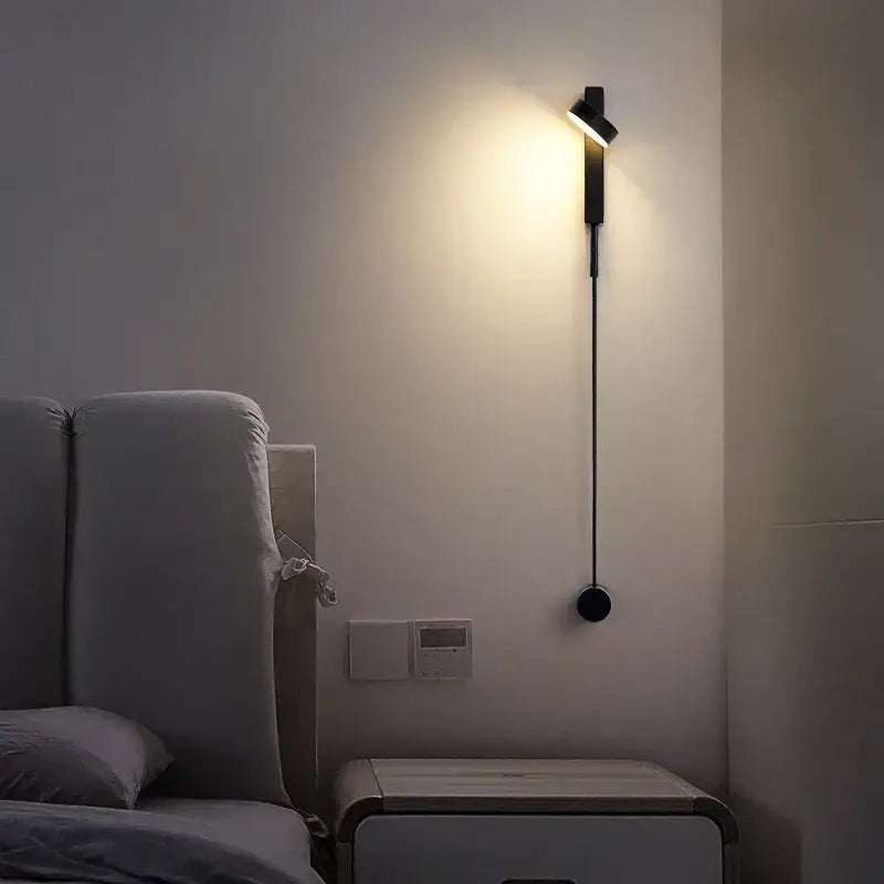 Black minimalist marble and black rotation led wall lamp with sleek elongated design and adjustable light head for bedroom decorbites