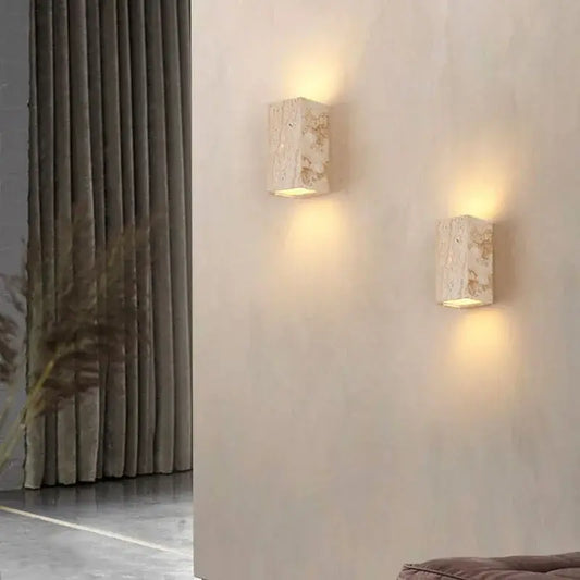 Two elegant rectangular wall lamps in light-colored marble with natural veining from decorbites cuboid stone led set