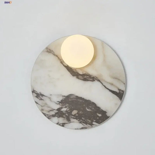 Modern marble glass globe led wall lamp featuring a circular marble sconce with warm glowing glass globe led light