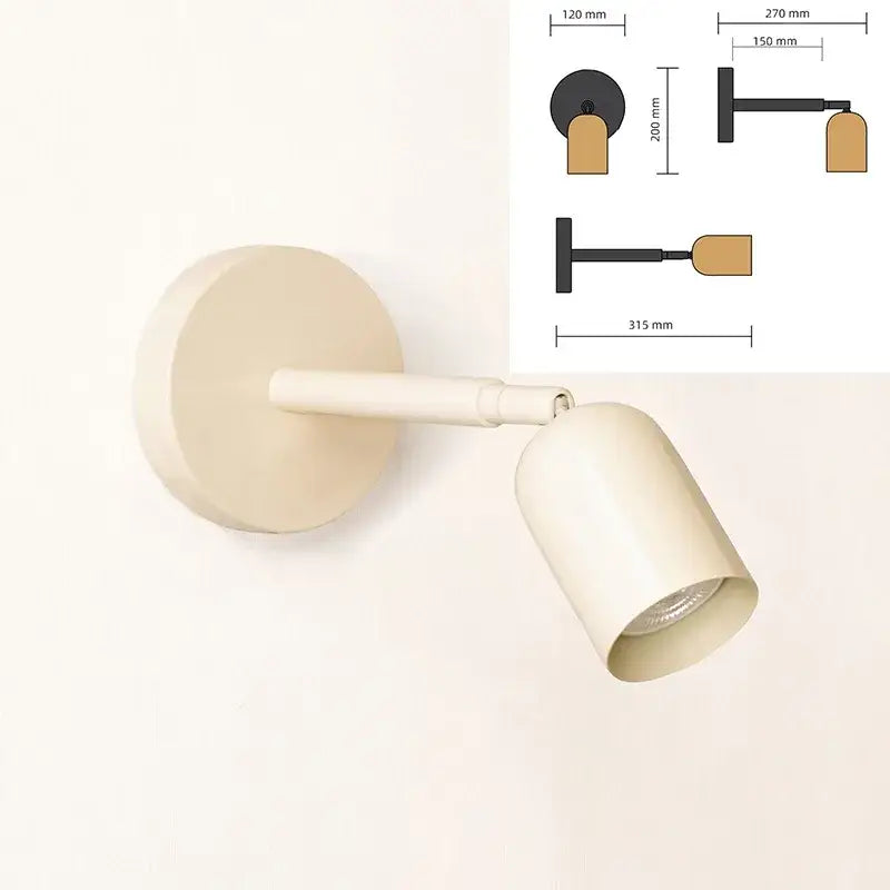 Cream-colored modern matte wall sconce with adjustable gu10 led and cylindrical head for bedroom lighting
