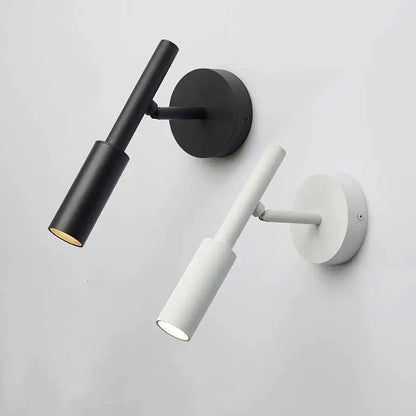 Modern matte black adjustable led wall lamp with cylindrical shades for bedroom reading light in minimalist design