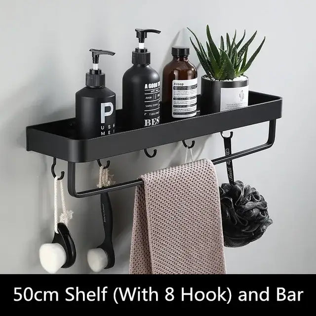 Modern matte black aluminum corner shelf bathroom storage holder with integrated bar and eight hooks holding toiletries and plant decorbites black aluminum black aluminum bathroom