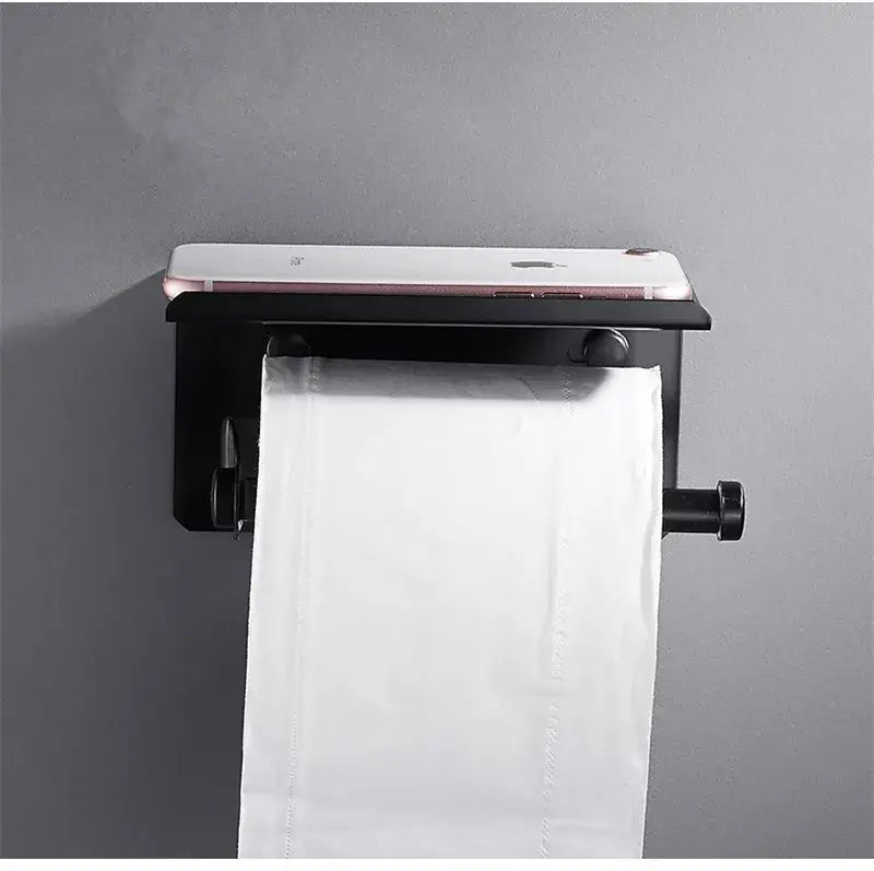 Modern matte black aluminum paper holder with sleek design holding white tissue roll for black aluminum bathroom decorbites
