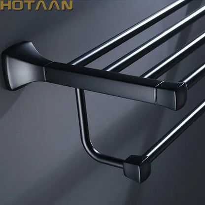 Modern matte black aluminum towel rack with hook and sleek square-ended bars in decorbites black aluminum finish
