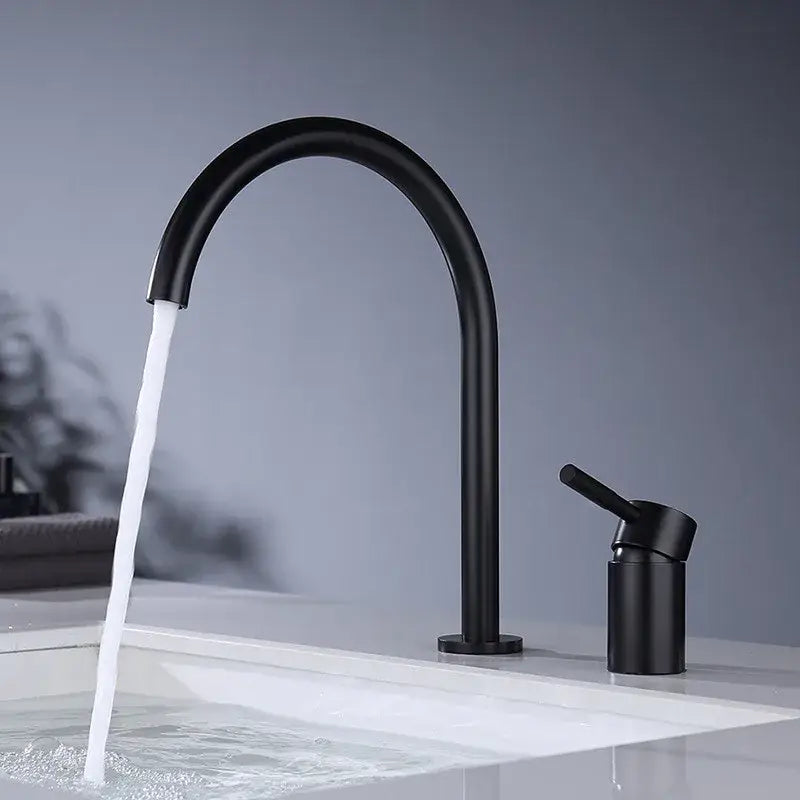Modern matte black and brushed gold basin faucet with sleek curved spout minimalist design decorbites black basin faucet