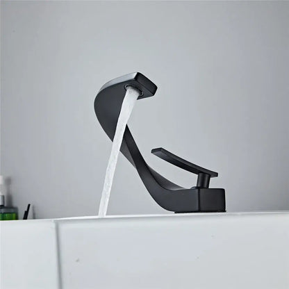 Modern matte black basin faucet with sleek curved design and single lever handle decorbites black basin faucet