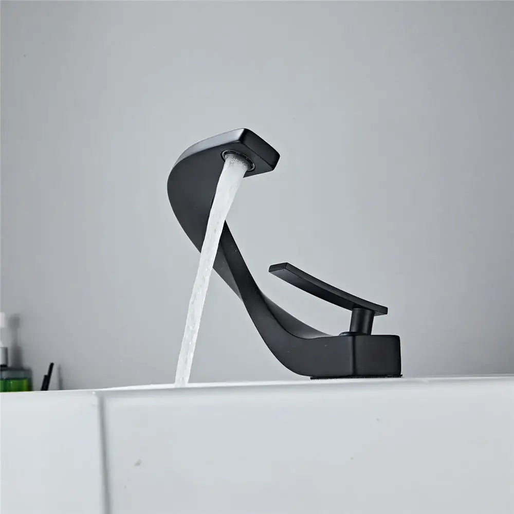 Modern matte black basin faucet with sleek curved design and single lever handle for bathroom decorbites black basin use