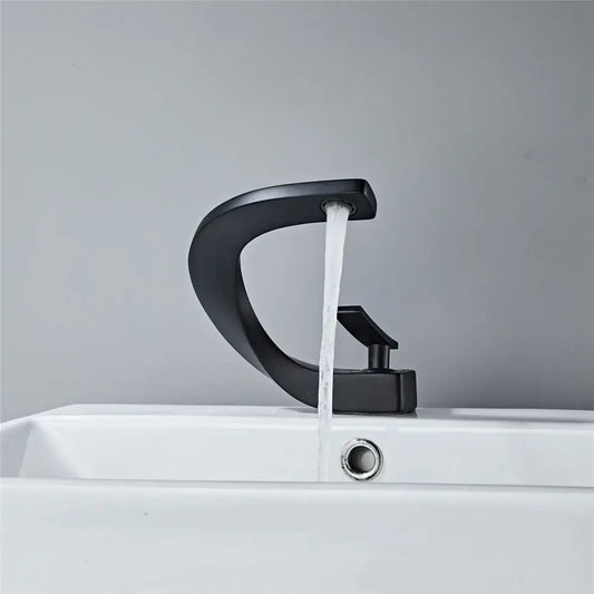 Modern matte black basin faucet with sleek curved design and black matte finish for bathroom hot cold mixing tap decorbites black basin