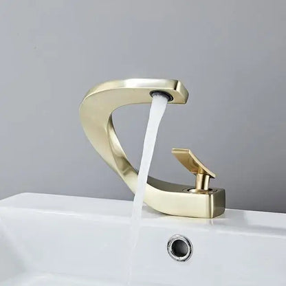 Modern gold-toned basin faucet with sleek curved design and polished finish for decorbites black basin faucet setups
