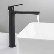 Modern matte black basin faucet with ceramic valve core and short tap styles features a sleek minimalist design