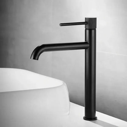 Modern matte black basin faucet with textured knob and minimalist design ideal for decorbites brushed gold inspired bathrooms