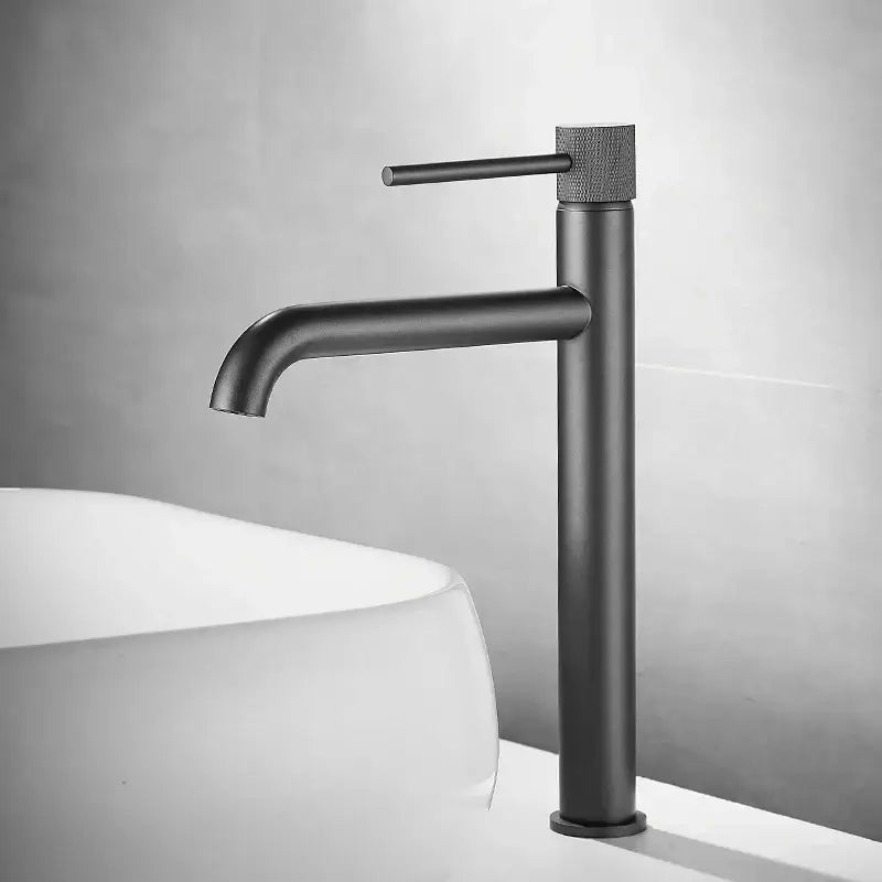 Modern matte black basin faucet with textured knurled handle and sleek cylindrical spout for bathroom sink mixer tap decorbites brushed gold alternative