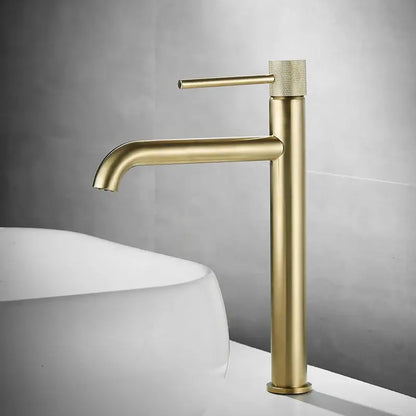 Modern matte black basin faucet with brushed gold textured knurled handle from decorbites brushed gold collection