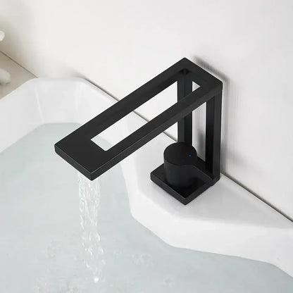 Modern matte black basin faucet with a minimalist rectangular spout and cylindrical handle for bathroom vessel sink
