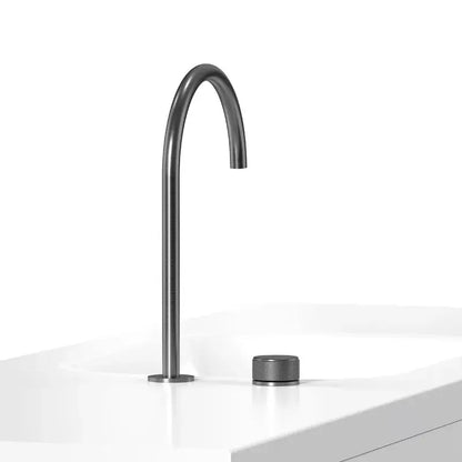 Modern matte black basin faucet with a sleek curved spout and textured cylindrical base for bathroom sinks by decorbites