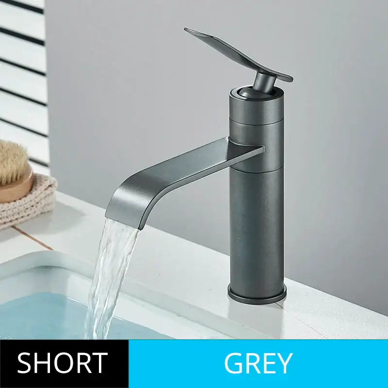 Modern matte black basin faucet mixer with a sleek grey matte finish and minimalist waterfall spout decorbites basin faucet