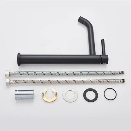 Modern matte black basin mixer tap with minimalist design and matching black flexible braided hoses for bathroom use