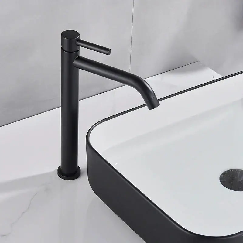 Modern matte black basin mixer tap with sleek minimalist design in black matte finish for bathroom use