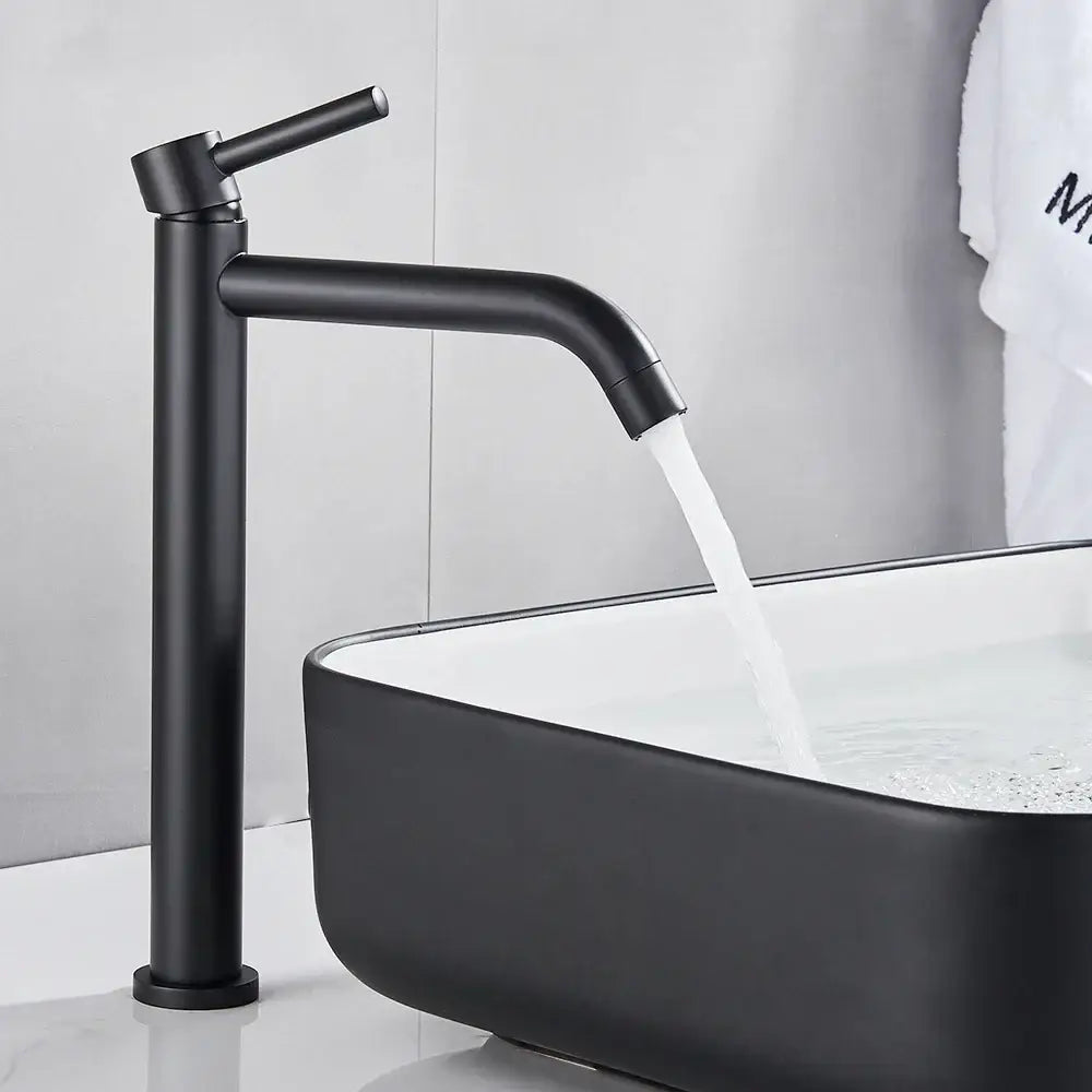 Modern matte black basin mixer tap with sleek tall design and curved spout for bathroom use