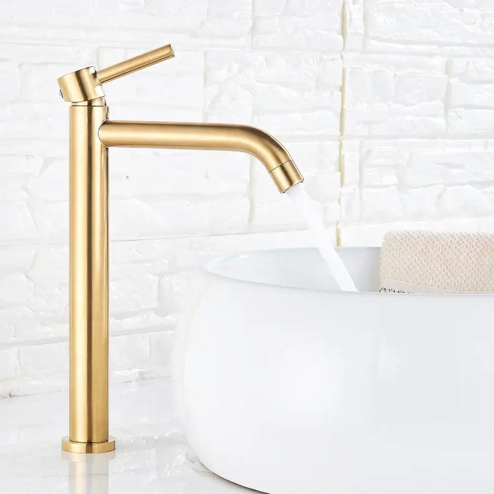 Modern matte black basin mixer tap with gold-toned sleek minimalist design and single lever handle for bathroom use