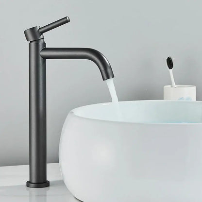 Matte black modern basin mixer tap with a sleek tall design and curved spout for bathroom use