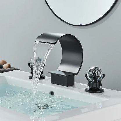 Modern matte black bathroom faucet set with black matte waterfall spout and crystal knob accents bathroom faucet set