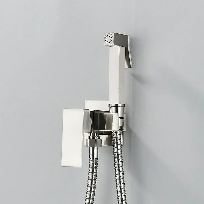 Modern matte black bidet shower faucet set featuring a chrome-finished wall-mounted bidet shower faucet with braided hose by decorbites