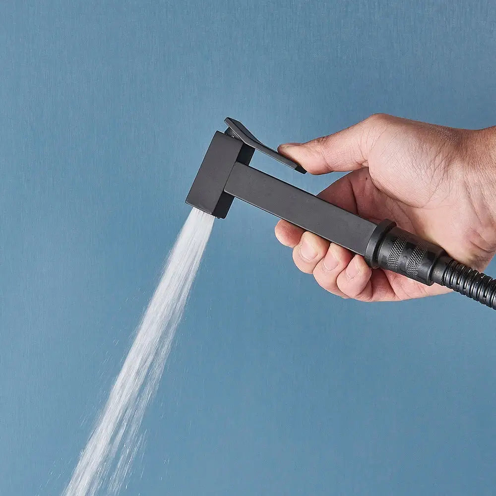 Modern matte black bidet shower faucet set featuring a black matte-finish handheld showerhead with textured grip handle
