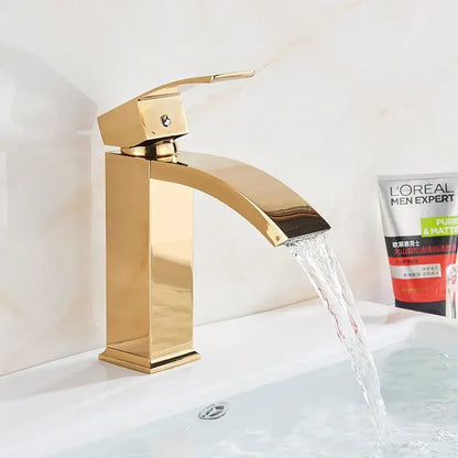 Modern matte black brass bathroom waterfall sink faucet with gold-toned sleek rectangular decorbites black brass design