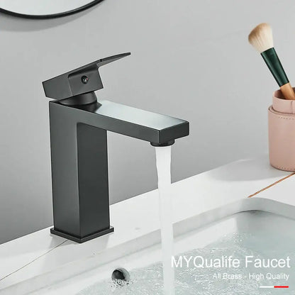 Modern matte black brass square basin faucet with sleek rectangular spout and handle by decorbites black brass