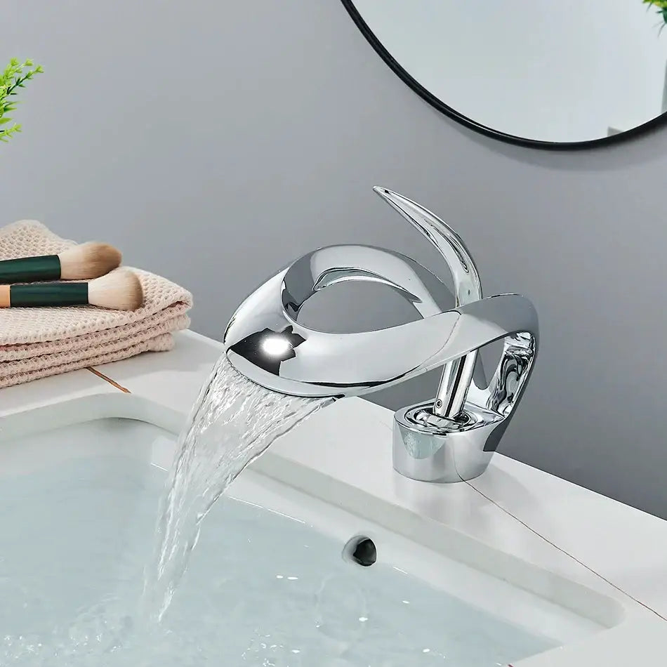 Modern matte black brass waterfall basin faucet with chrome finish flowing water stream for bathroom vanity tap