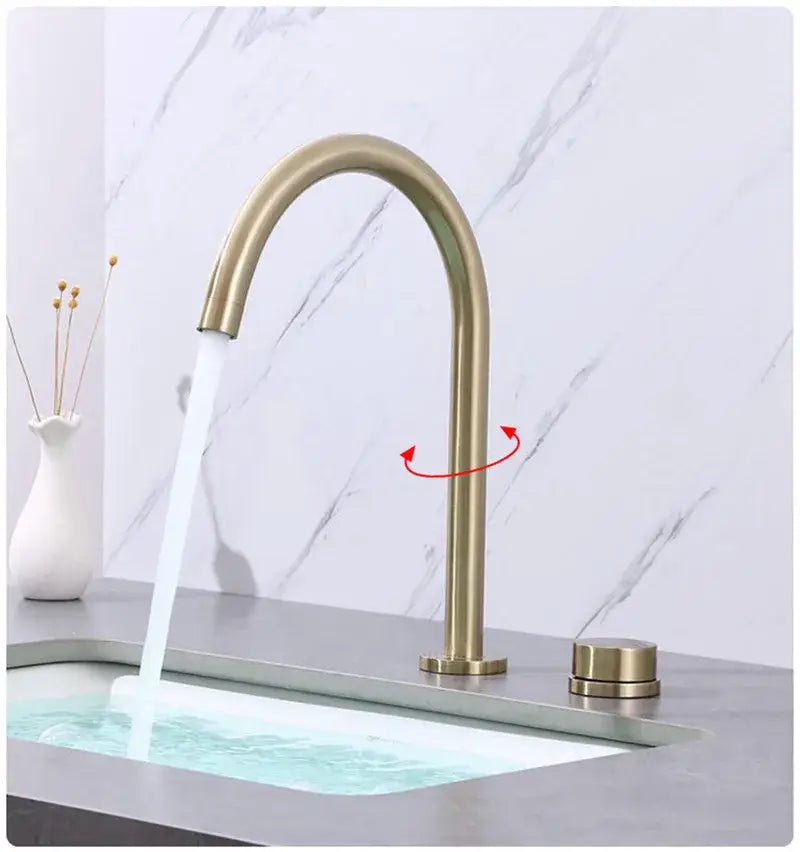 Modern matte black and brushed gold basin faucet with a sleek curved spout and decorbites brushed gold finish