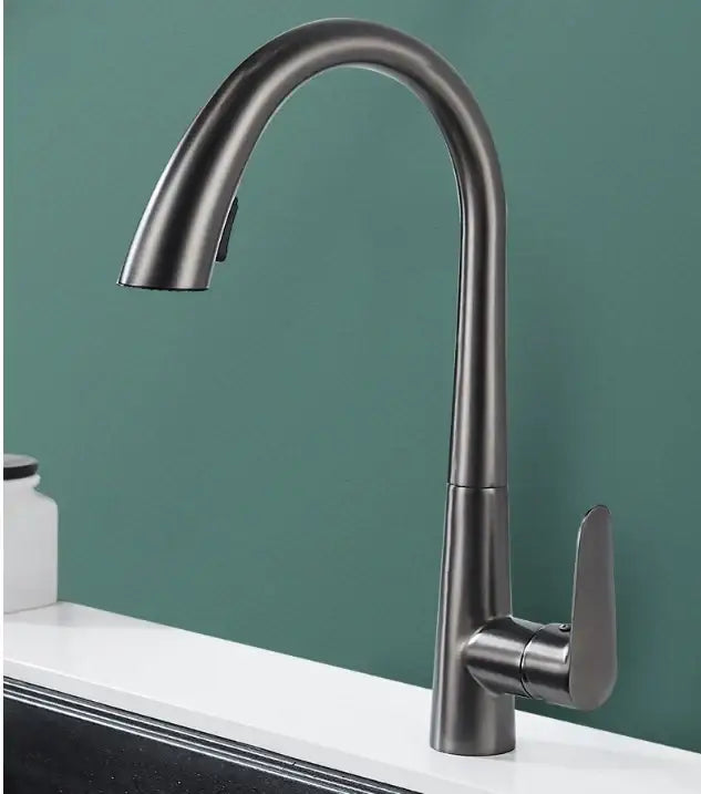 Modern matte black and brushed gold kitchen faucet with sleek curved spout and minimal decorbites black brushed design