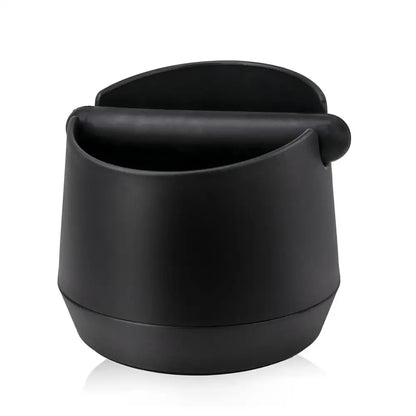 Modern matte black coffee knock box with black matte-finish coffee scoop and ergonomic handle for efficient coffee knock use