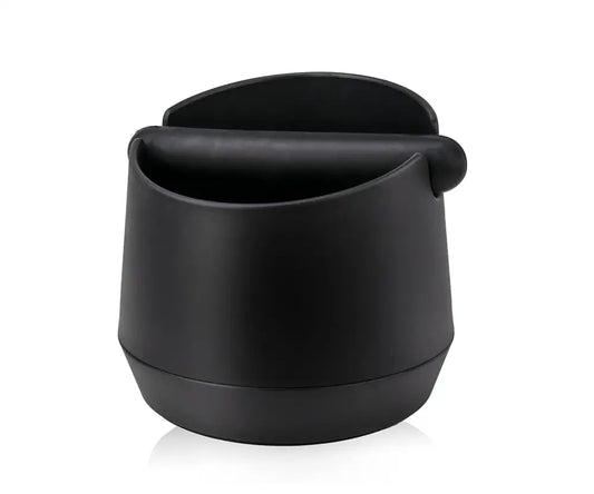 Modern matte black coffee knock box with black matte-finish coffee scoop featuring ergonomic handle and sleek design