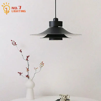 Black matte pendant light with layered flared design for modern flying saucer decorbites modern flying use