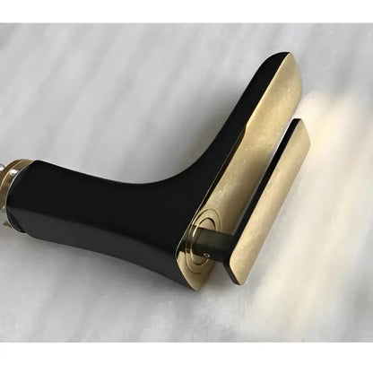 Black and gold hair straightener with sleek ergonomic design complements decorbites basin faucet bathroom mixer tap