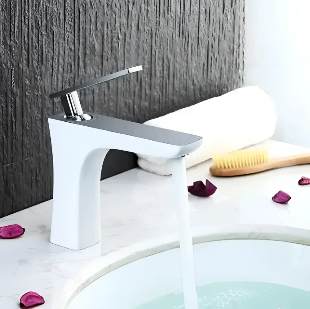 Modern white and chrome basin faucet with sleek minimalist design by decorbites for bathroom use