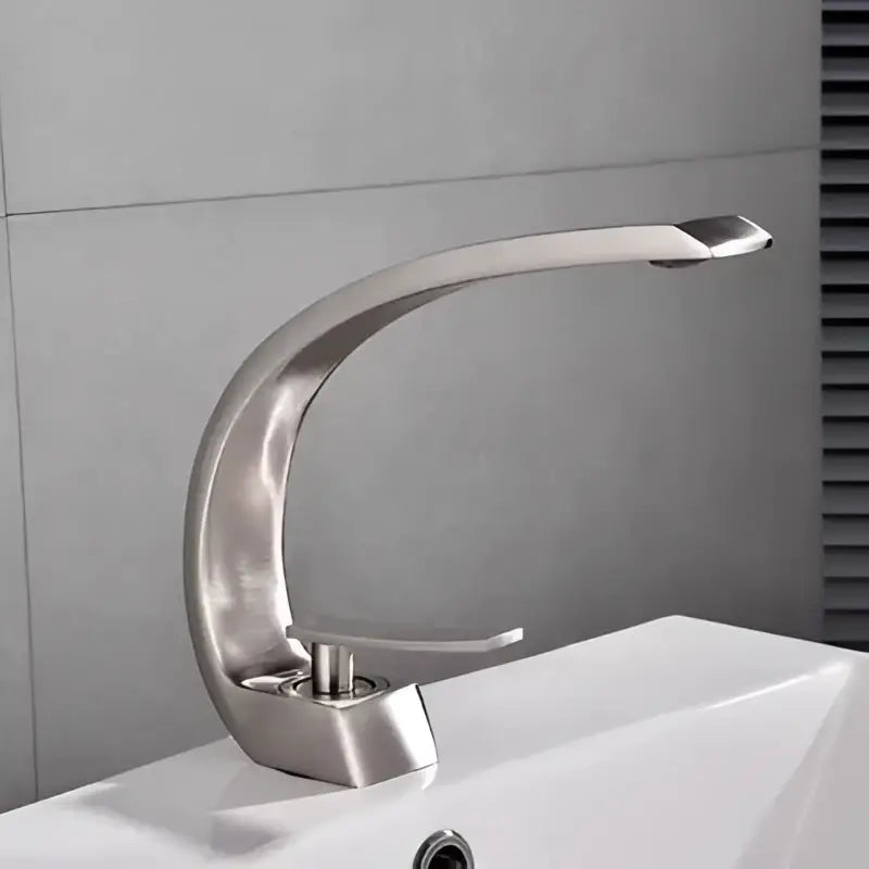 Modern matte black and gold modern basin faucet with brushed stainless steel curved design and single lever handle