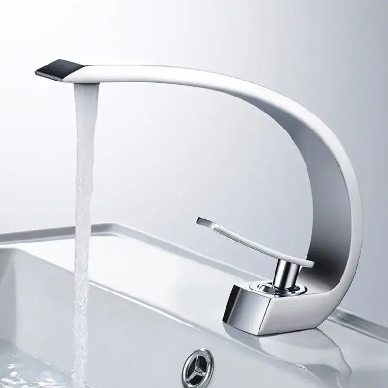 Modern chrome-finished basin faucet with sleek curved design and black accent for gold modern basin bathroom use